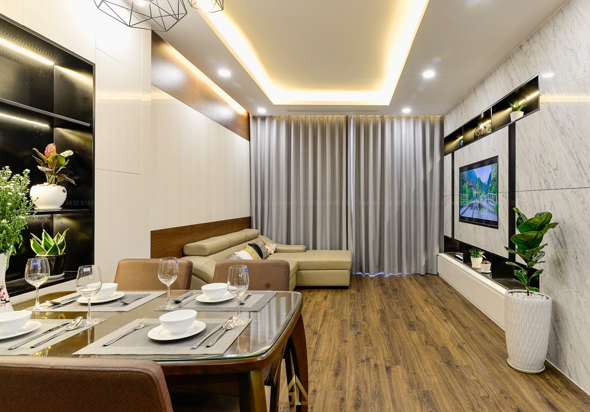 Phòng khách ốp gỗ ấm áp và sang trọng (Nguồn ảnh: SLV Vietnam)