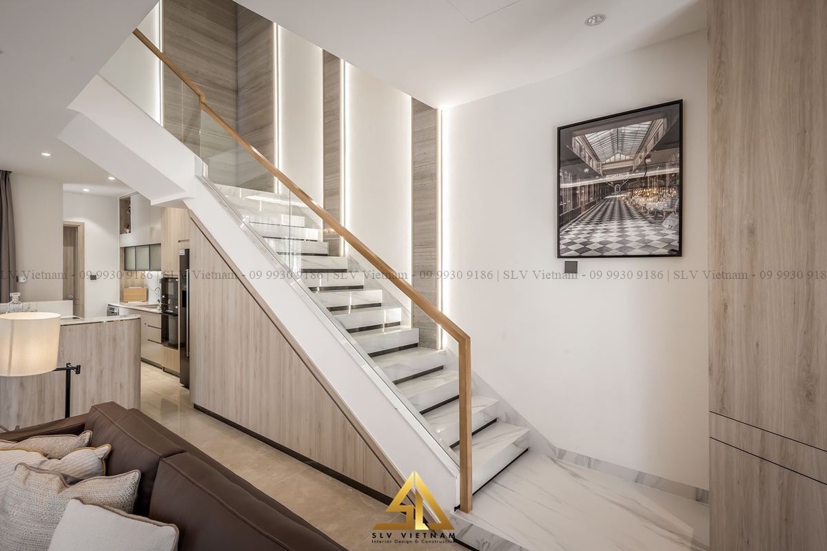 Tận dụng gầm thang thiết kế hệ tủ âm tường
